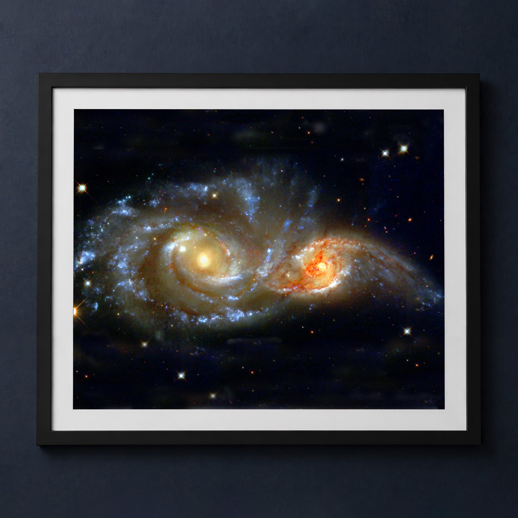 Framed print mockup — Two Colliding Galaxies