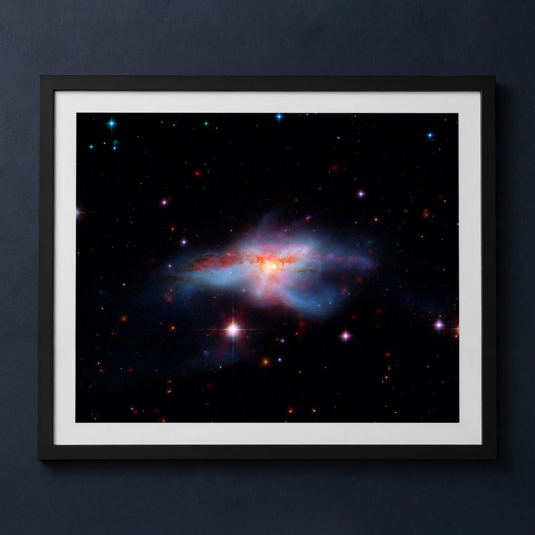 Framed print mockup — Spitzer Colliding Galaxies